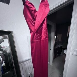 Red strapless gown with mini train
